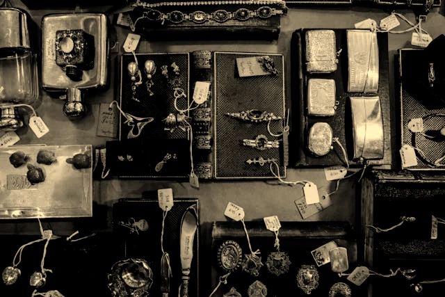 Antique shop product display with price tags